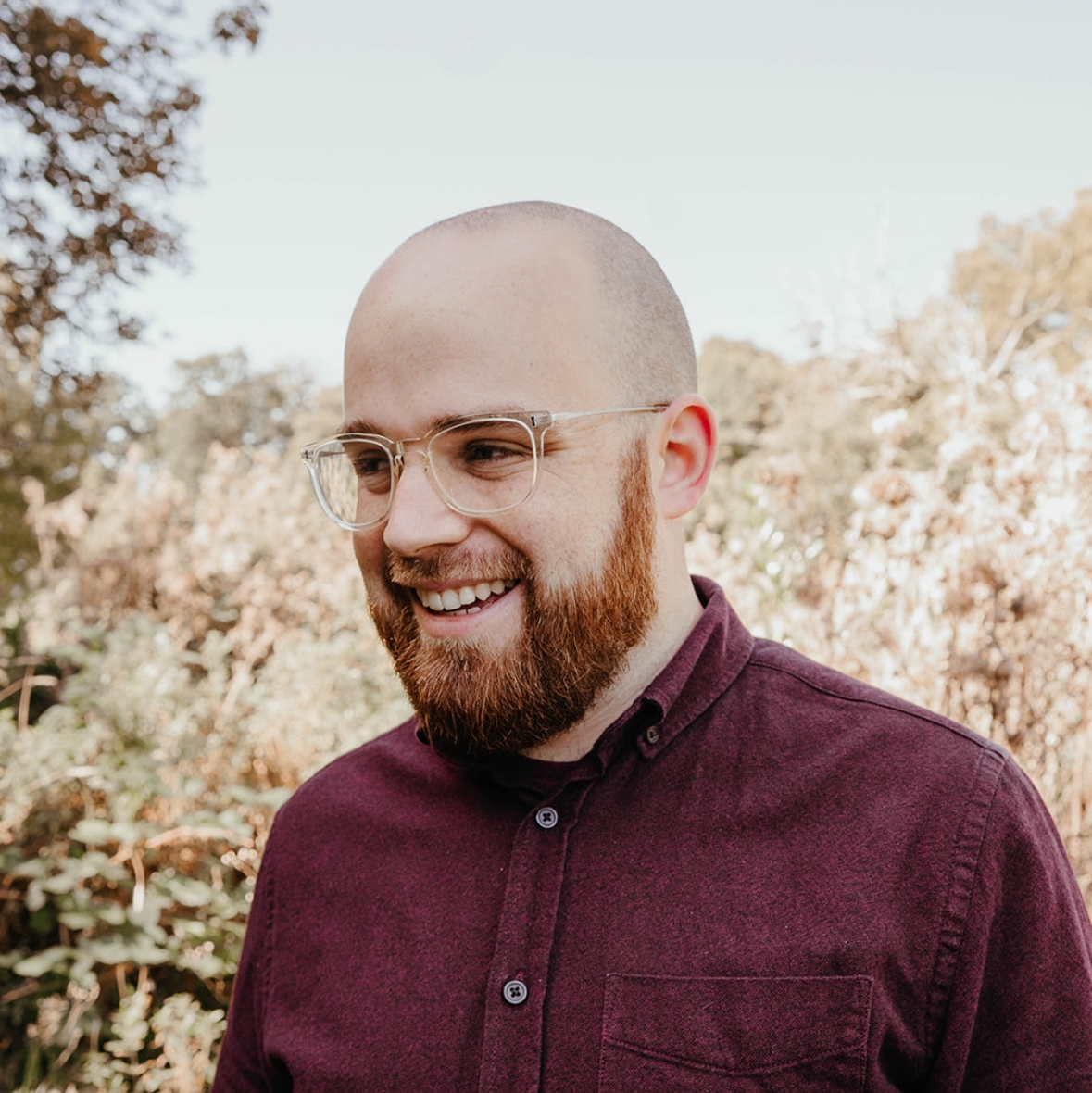 Freddie Harrison smiling outdoors